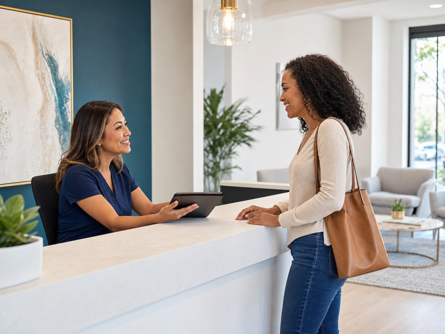 A new patient being warmly welcomed at a modern dental clinic